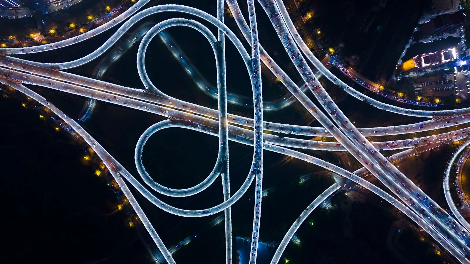 Aerial view of a highway interchange at night